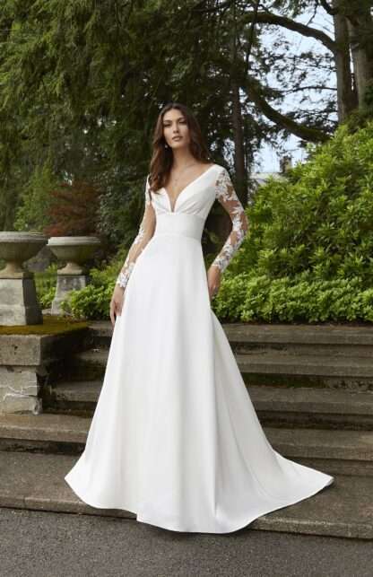 5960 Beatrix Morilee Wedding Dress. Similar to Sizanne Neville. Lace long sleeves with satin mikado a line skirt and v neckline. Chameleon Bride Dorset