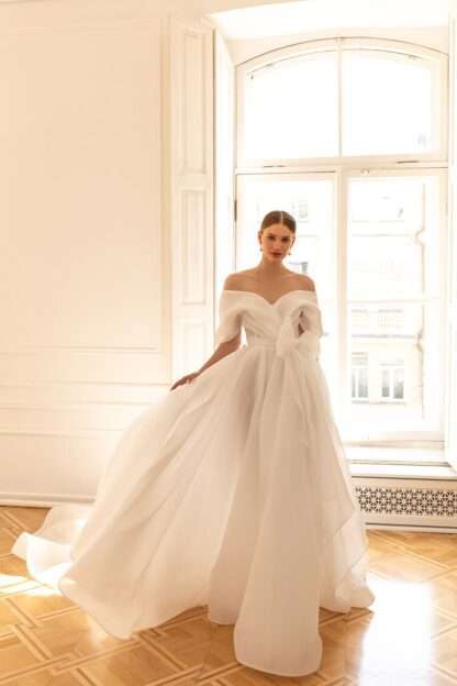 Darling Eva Lendel Wedding Dress. Off shoulder organza lightweight dress. Less is more 2022. Chameleon Bride Bournemouth Dorset