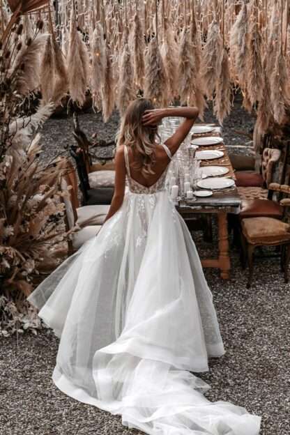 Monia E154 by Abella Wedding Dress. Square neck beaded wedding dress with detachable overskirt train. Allure Bridals. Chameleon Dorset