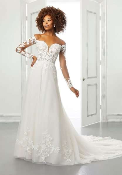 Brienne 5902 Morilee wedding dress. Off shoulder lace wedding dress with sleeves and plain skirt. 