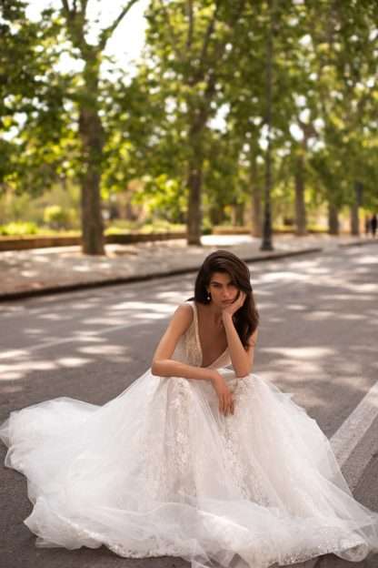 Toscana by Eva Lendel wedding dress.  V neck plunge aline wedding dress with sparkle lace and tulle.