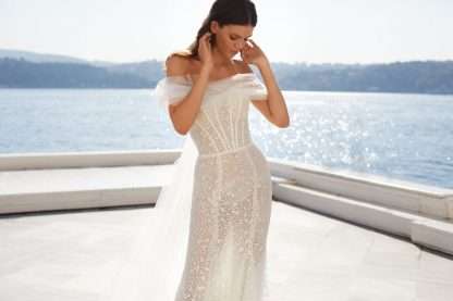 Irma Milla Nova Wedding Dress Off shoulder berta bardot lace sexy bridal gown. Chameleon Bride Bournemouth Dorset