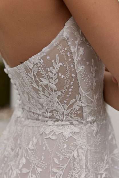 Dayni Madi Lane strapless boho aline wedding dress.