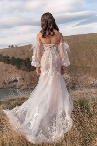 Kyla Madi Lane strapless wedding dress with lace up corset back and detachable sleeves.