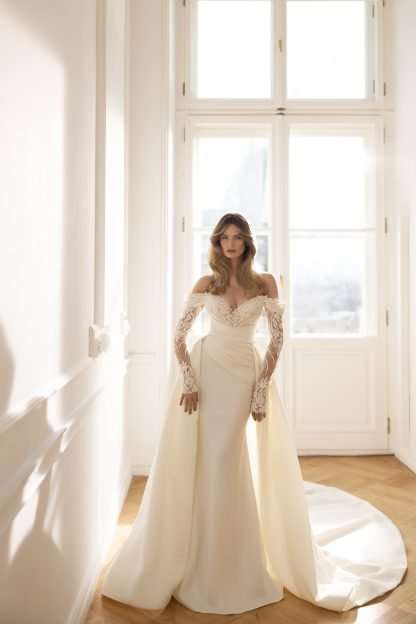 Scandi Eva Lendel wedding dress with beaded top, plain skirt, long sleeves and detachable overskirt. Chameleon Bride Bournemouth Dorset