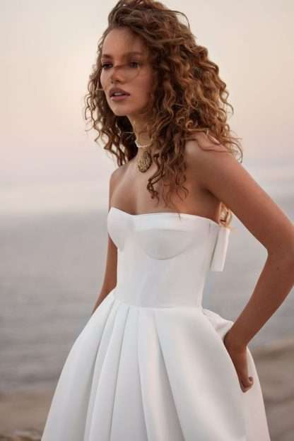 Layla Milla Nova White and LAce. Plain satin ballgown wedding dress with open bow detail on back. Modern brirde. Clean and simple bridal gown. Chameleon Bride Bournemouth Dorset
