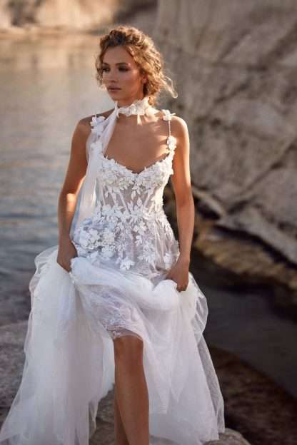 Eleanor White and Lace Calypso Milla Nova wedding dress. Spaghetti strap chantilly lace with corset detailing and sheer skirt. Chameleon Bride Bournemouth Dorset