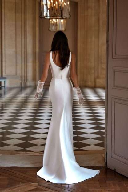 Ava Lorenzo Rossi by Milla Nova. Square neck plain wedding dress with skirt split. Chameleon Bride Bournemouth Dorset