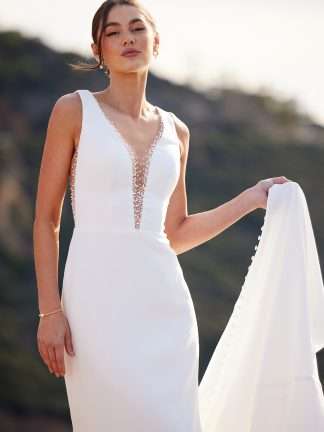 Essense of Australia D3763 Fittedplain stretch crepe gown with v neck plunge and beading and low back.