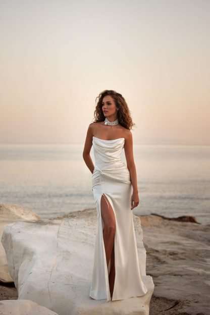 Genevieva Milla Nova. Strapless plain satin sheath wedding dress with pearl details and corset back. Chameleon Bride Bournemouth Dorset