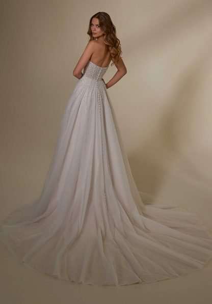 Maritza Morilee Wedding Dress. Strapless dipped scoop modest neckline with beads and pearls and a tulle princess aline skirt. Sparkling bridal gown. Chameleon Bride Bournemouth Dorset