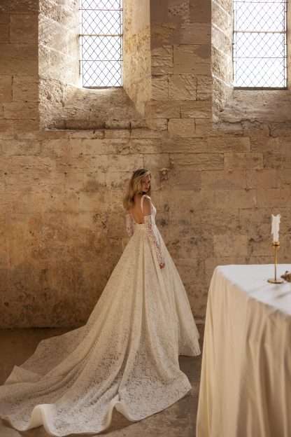 Lucrecia Eva Lendel wedding dress. Cotton matt lace with maching lace gloves/sleeves. Square neck aline dress. Chameleon Bride Bournemouth Dorset