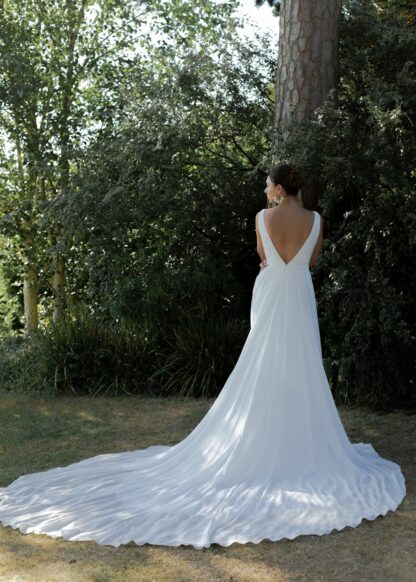 ME077 Teresa Atelier Wedding Dress Chameleon Bride Dorset. Plain plunge front sheath crepe gown with detachable chiffon overskirt.