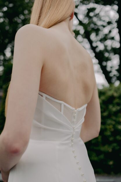 Amani ME128 Teresa Atelier Plain crepe strapless wedding dress with pearl detailing and leg split. Chameleon Bride Bournemouth Dorset