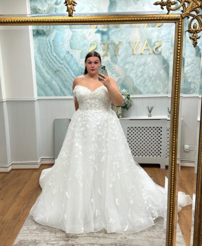 Tamzin CV1010 Teresa Atelier wedding dress for curvy plus size brides with curves. Off shoulder strapless gown with sparkle and lace applique. Chameleon Bride Bournemouth Dorset