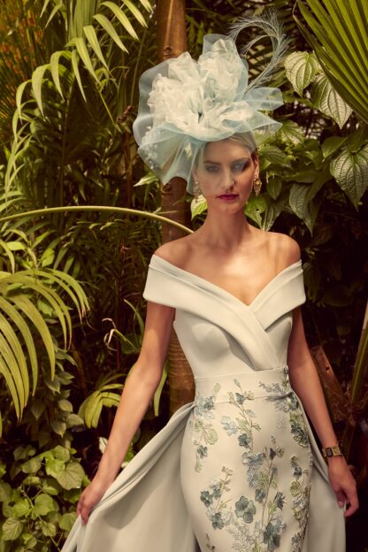 992264B Veni Infantino Sage green mother of the bride groom dress. Fitted skirt with overskirt. Moden mum of the bride. Chameleon Dorset Hampshire