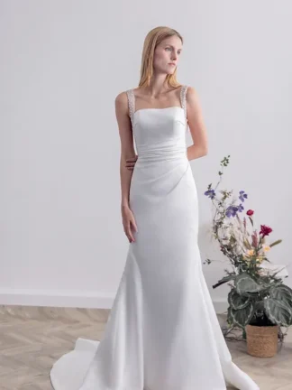 Square neck plain satin sheath wedding dress with pearl and crystal detailing. Chameleon Bride Bournemouth Dorset