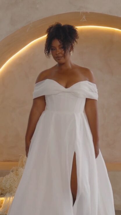 Prestyn Madi Lane. Off shoulder plain organza wedding dress. Soft and flowy with leg split. Chameleon Bride Bournemouth Dorset