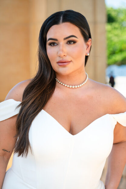 Essense of Australia  Fitted plain stretch crepe plus size wedding dress with boned corset top, off shoulder, modest neckline and leg split Available to try at Chameleon Bride Bournemouth Dorset