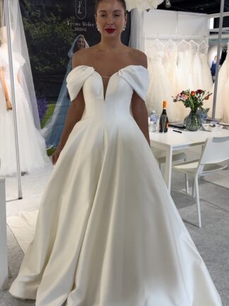Strapless sweetheart plain sating aline wedding dress with ballgown skirt, detachable off shoulder cuff straps and cape.  Dress Available in UK12/UK14 By Teresa Atelier PN1025 Chameleon Bride Bournemouth Dorset