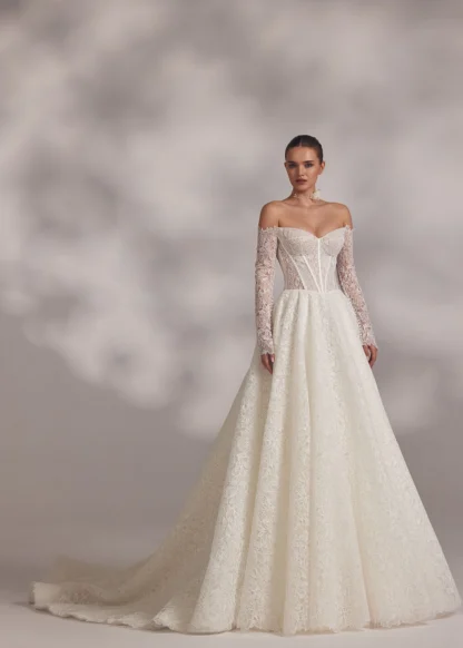 Eva Lendel Abril aline wedding dress. less is more. Off shoulder guipure boho lace with long sleeves, corset detailing. Chameleon Bride Bournemouth Dorset