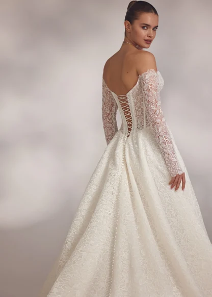 Eva Lendel Abril aline wedding dress. less is more. Off shoulder guipure boho lace with long sleeves, corset detailing. Chameleon Bride Bournemouth Dorset