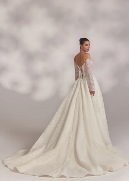 Eva Lendel Abril aline wedding dress. less is more. Off shoulder guipure boho lace with long sleeves, corset detailing. Chameleon Bride Bournemouth Dorset
