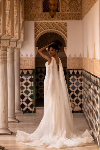 Malma WONA concept wedding dress. Beaded fitted sheath column wedding dress with square neckline and tulle wings. Chameleon Bride Bournemouth Dorset