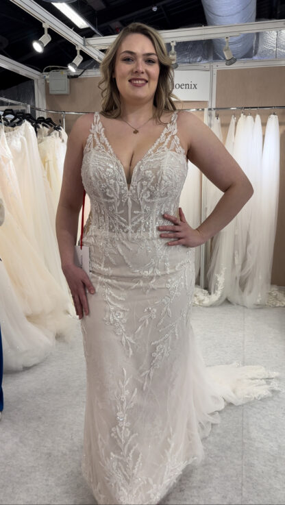 Ellie beaded sparkle fitted wedding dress with straps and layered beaded lace. Perfect for those curvy brides who want to flaunt their curves and love all the bling. Plus size wedding dress. Part of our Curvy Bride Collection at Chameleon Bride and is available in a UK22