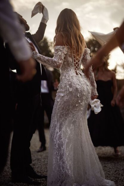Montana off shoulder long sleeve Milla Nova wedding dress. Beaded sparkle bridal gown with lace up back. Chameleon Bride Bournemouth Dorset