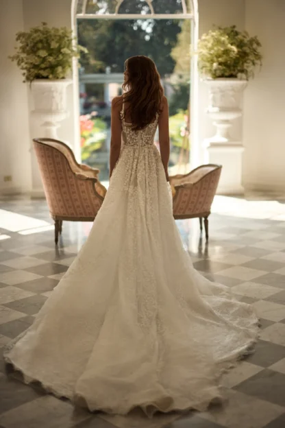 Noomi Lorenzo Rossi for Milla Nova square neck leafy lace wedding dress. Part of the Sleeping Beauty collection. Chameleon Bride Bournemouth Dorset
