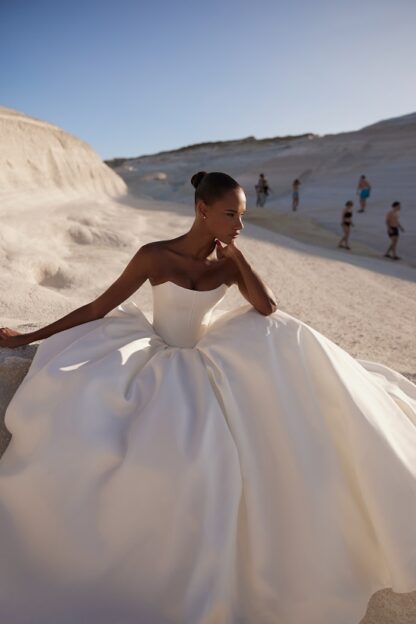 Este by Eva Lendel strapless scoop neck satin ballgown wedding dress with v basque corset waist and full aline skirt. Chameleon Bride Bournemouth Dorset